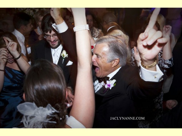 Older man enjoying music, having a good time